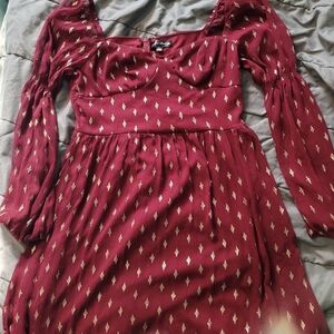 Large Crystal Doll dress. Burgundy base color and Gold diamonds.